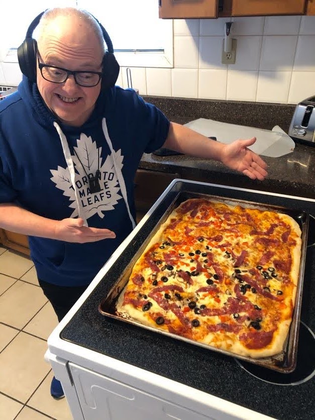 Warren making pizza | CLO